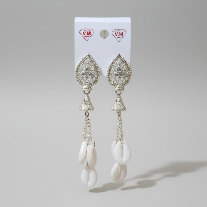 Gold and white earrings