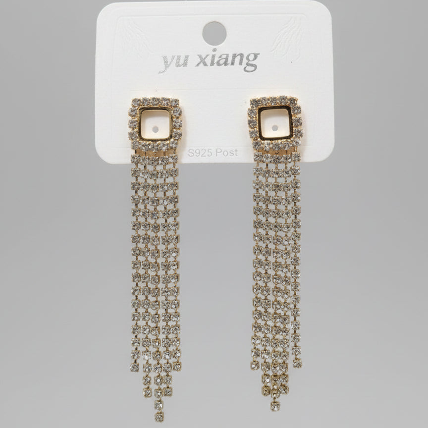 Gold-framed earrings with tassels